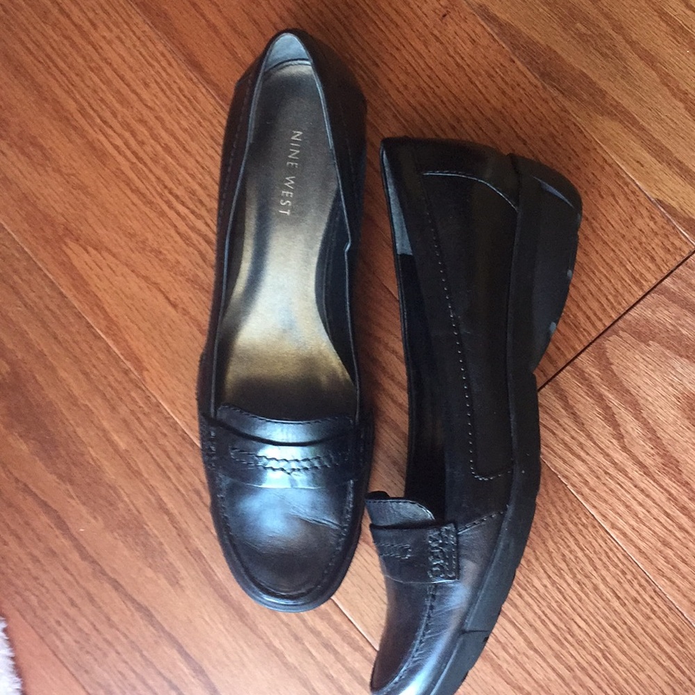 Black leather flats